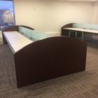 Guggenheim Woodtronics Trading Desks positioned in empty office