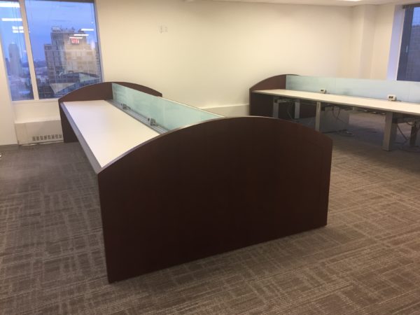 Guggenheim Woodtronics Trading Desks positioned in empty office