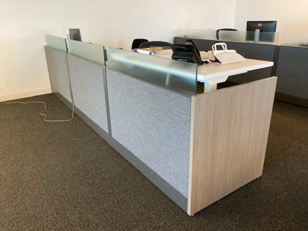 Ledger X Knoll Sit/Stand Desks in office corner view