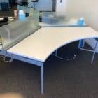 white Ledger X Knoll Sit/Stand Desks set up in office