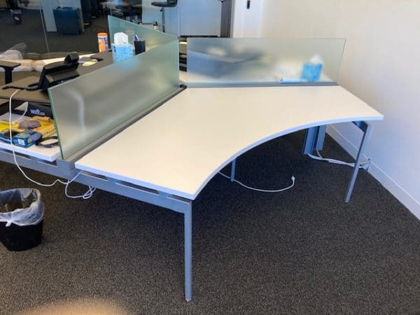 white Ledger X Knoll Sit/Stand Desks set up in office