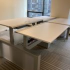 4 sit / stand trading desks in stand mode