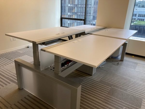 4 sit / stand trading desks in stand mode