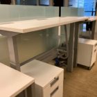 white sit/stand trading desks installed front view