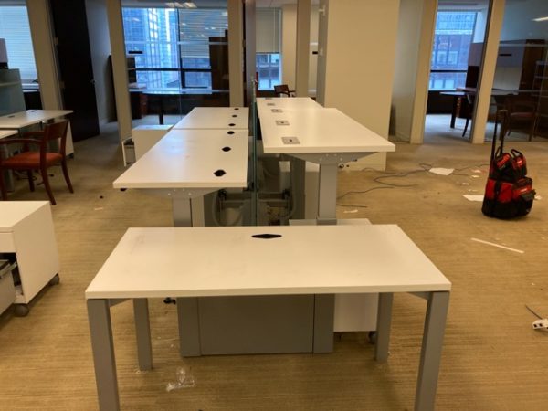 white sit/stand trading desk installation