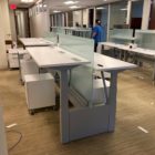 sit/stand trading desks being installed in office