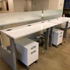 Piper- Used Teknion Sit / Stand Trading Desks