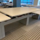 white Piper- Used Innovant Sit / Stand Trading Desks in office